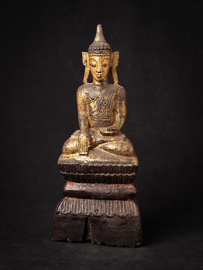 Antique wooden Tai Lue Buddha